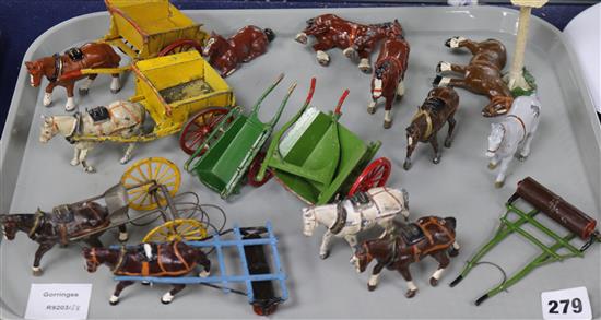 A collection of mostly Britains horses and carts, ploughs, etc.